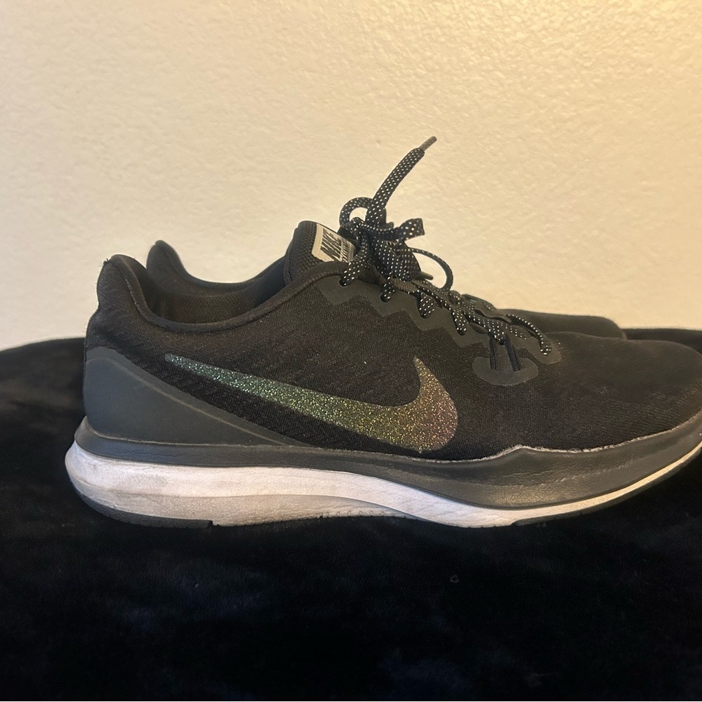 Nike women’s Black and Iridescent Athletic Shoes